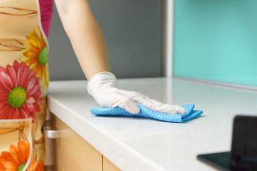 Highbury deep cleaning team separating recyclable waste during a sustainable service