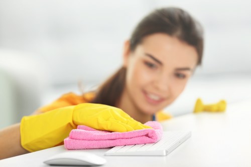Local oven cleaning technician working in a Highbury flat kitchen