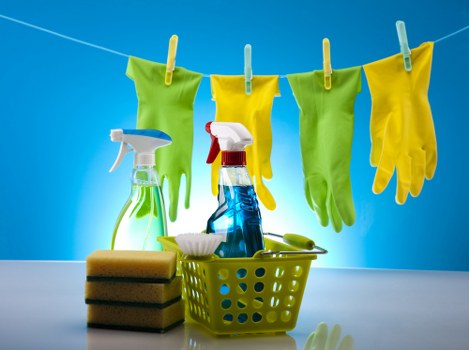 Staff member wearing PPE while performing a deep clean